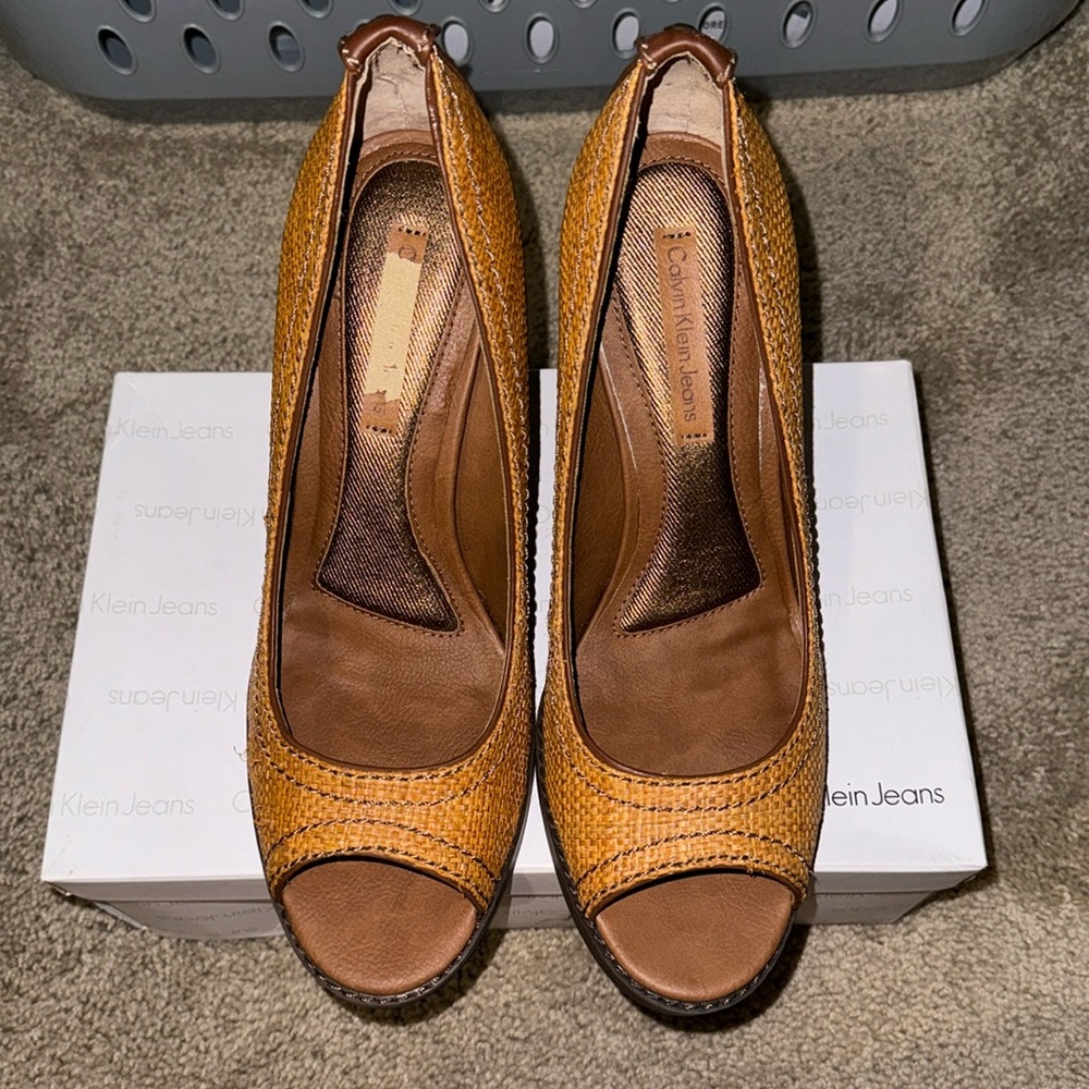 Brand new with box Calvin Klein heels size 10.